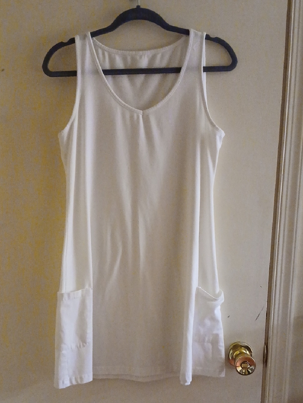 White Sleeveless Pocket Tunic Dress